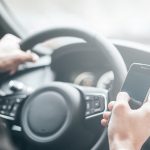 Using a Mobile Phone While Driving - Moore Motoring Law, Nottingham, UK